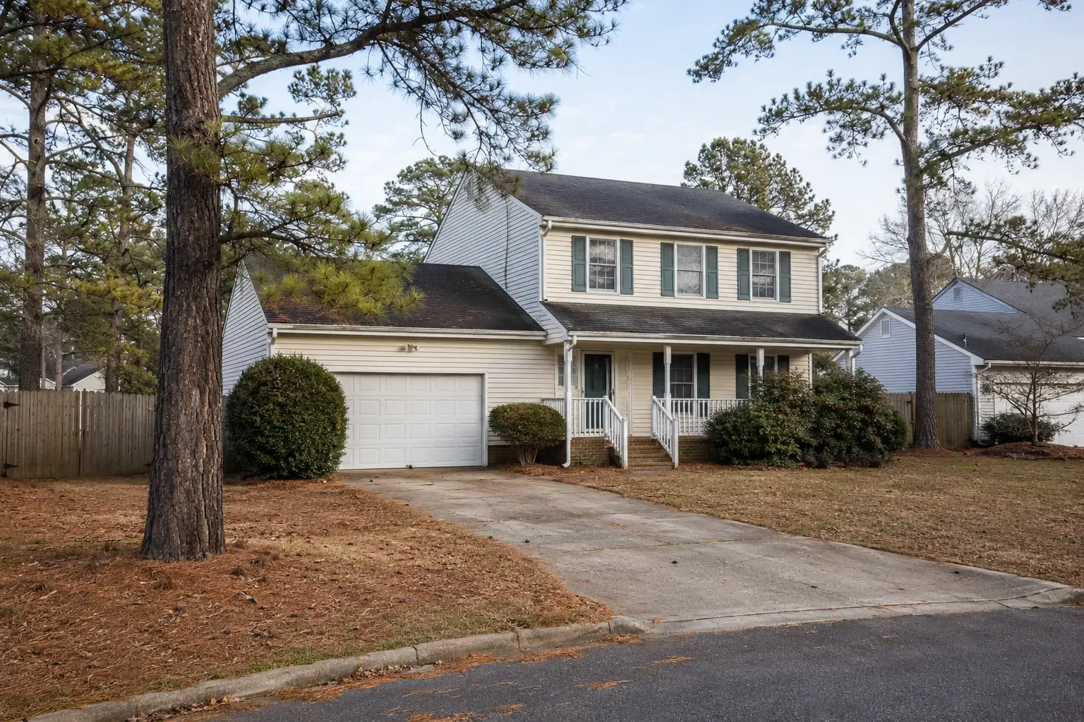 A suburban home with coastal landscaping